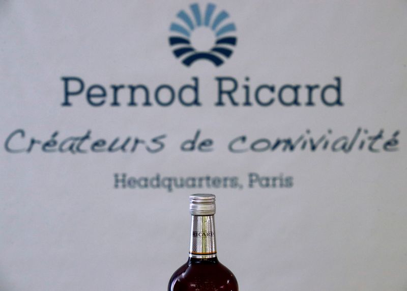 A logo is seen on a bottle of the Ricard aniseed-flavoured beverage displayed during French drinks maker Pernod Ricard news conference to announce the company annual results in Paris