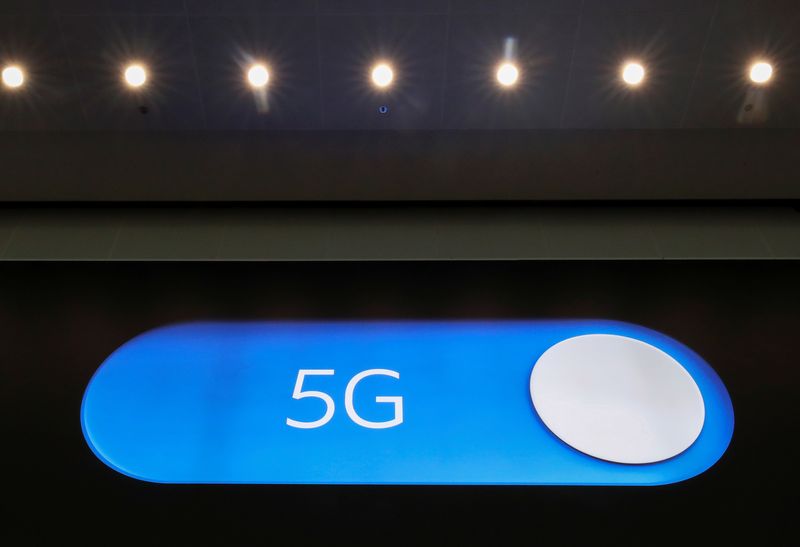 An advertising board shows a 5G logo at the International Airport in Zaventem