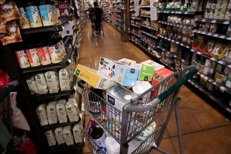 FILE PHOTO: A shopping cart is seen in a supermarket as inflation affected consumer prices in Manhattan, New York City