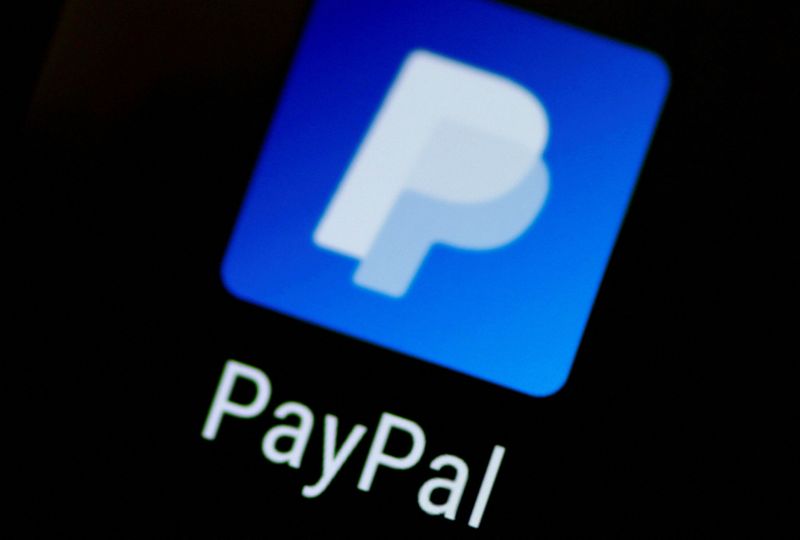 FILE PHOTO: Illustration photo of the PayPal app on a phone
