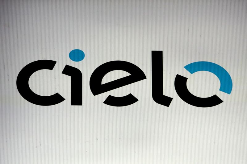 The company logo for Cielo is displayed on a screen on the floor of Brazil's B3 Stock Exchange in Sao Paulo
