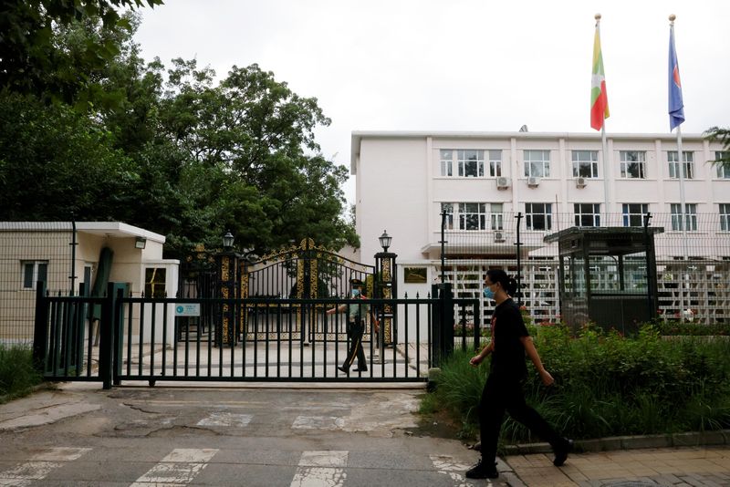 Man walks past the Myanmar embassy in Beijing