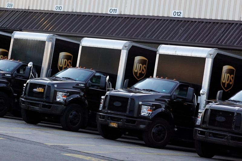 FILE PHOTO: United Parcel Service (UPS) vehicles are seen at a facility in Brooklyn, New York City