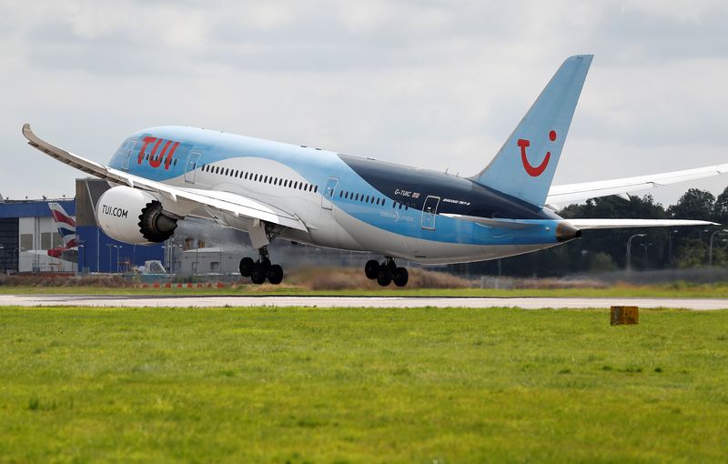 FILE PHOTO: A Boeing 787 of the travel company TUI takes off from the southern runway at Gatwick Airport in Crawley