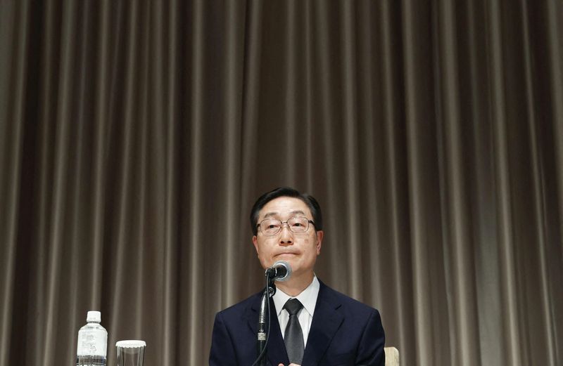FILE PHOTO: Tomihiro Tanaka, president of Unification Church attends a news conference in Tokyo