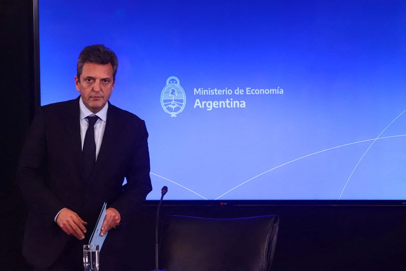 FILE PHOTO: Argentina's new Economy Minister Sergio Massa talks to the media, in Buenos Aires