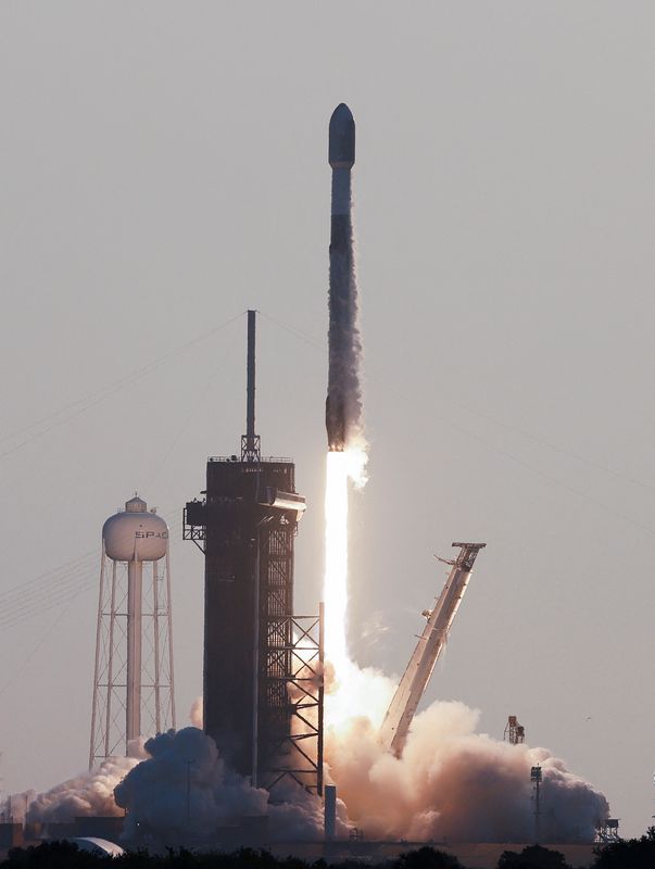 FILE PHOTO: A SpaceX Falcon 9 rocket lifts off, carrying 53 Starlink internet satellites, from the Kennedy Space Center in Cape Canaveral