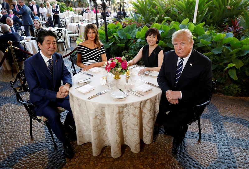 FILE PHOTO: U.S. President Donald Trump and first lady Melania dine with  Japan's PM Abe and wife in Palm Beach