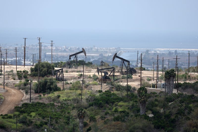 FILE PHOTO: Pump jacks operate in an oil field in Los Angeles