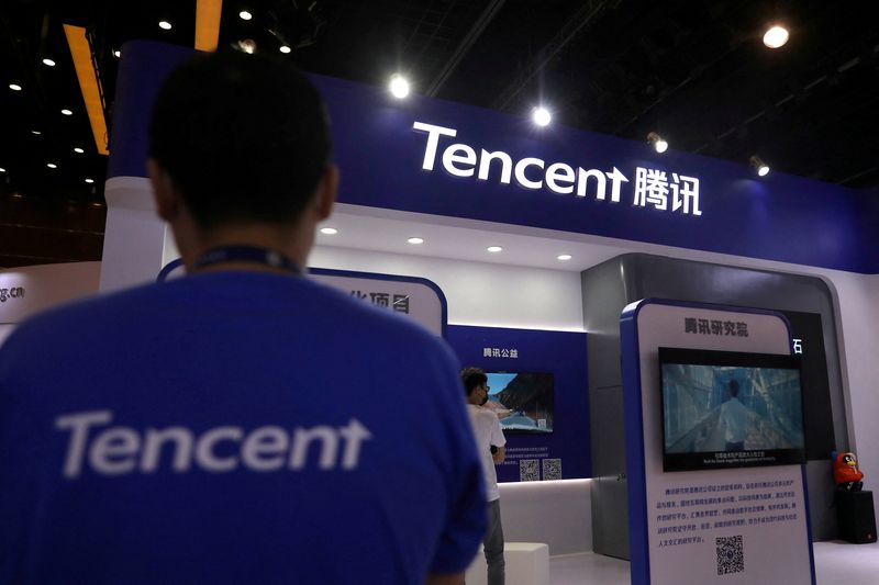 FILE PHOTO: Tencent logo displayed at a conference