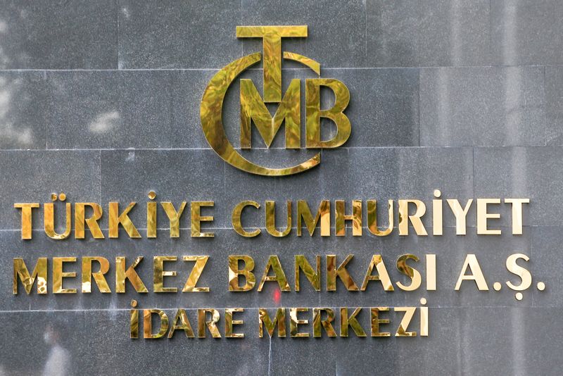 FILE PHOTO: A logo of Turkey's Central Bank is pictured at the entrance of its headquarters in Ankara