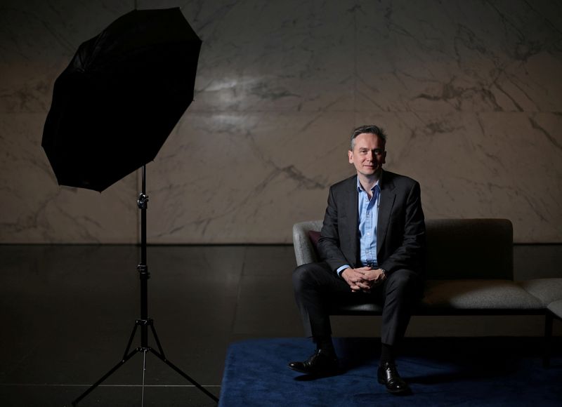 FILE PHOTO: Jean-Sebastien Jacques, CEO of Rio Tinto Group poses for a portrait ahead of the publication of the company 2019 full year results in London