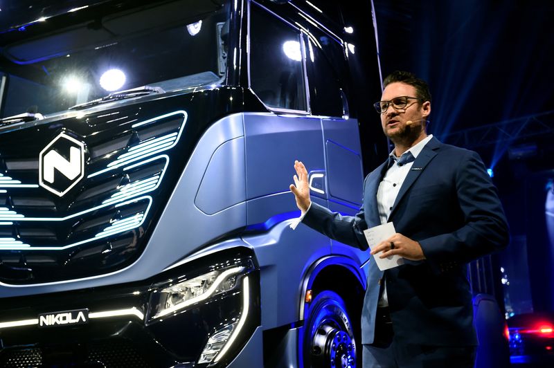 FILE PHOTO: CEO and founder of U.S. Nikola Trevor Milton speaks during presentation of its new full-electric and hydrogen fuel-cell battery trucks in partnership with CNH Industrial, at an event in Turin