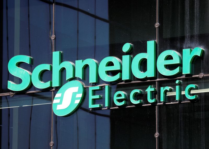 FILE PHOTO: The logo of Schneider Electrics is pictured at the company's headquarters in Rueil-Malmaison near Paris