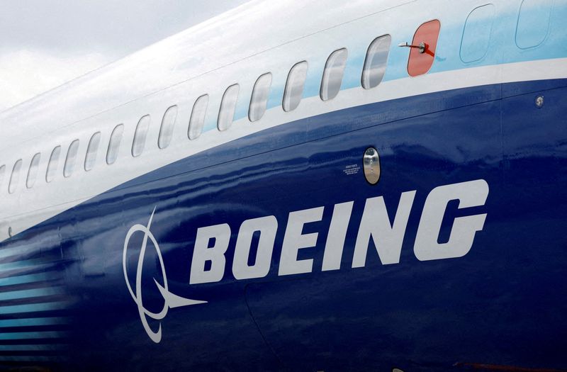 FILE PHOTO: The Boeing logo is seen on the side of a Boeing 737 MAX at the Farnborough International Airshow