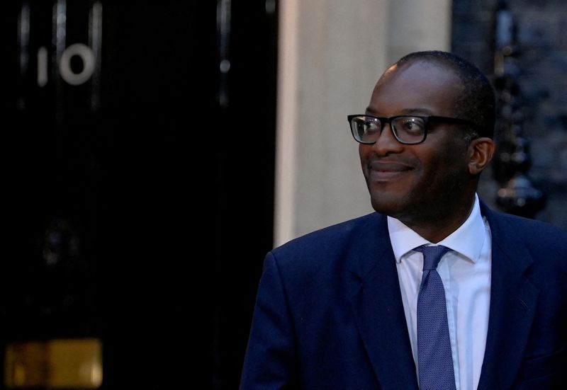 FILE PHOTO: New British Health Chancellor of the Exchequer Kwasi Kwarteng walks outside Number 10 Downing Street in London