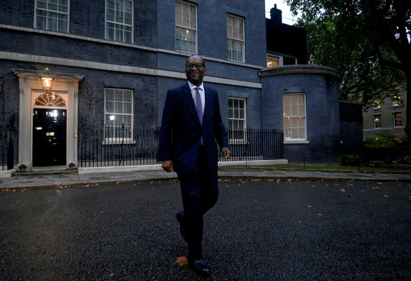 FILE PHOTO: New British Health Chancellor of the Exchequer Kwasi Kwarteng walks outside Number 10 Downing Street in London