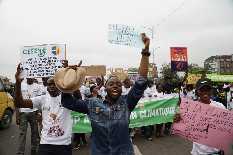 Activists take part in a climate action protest in Kinshassa