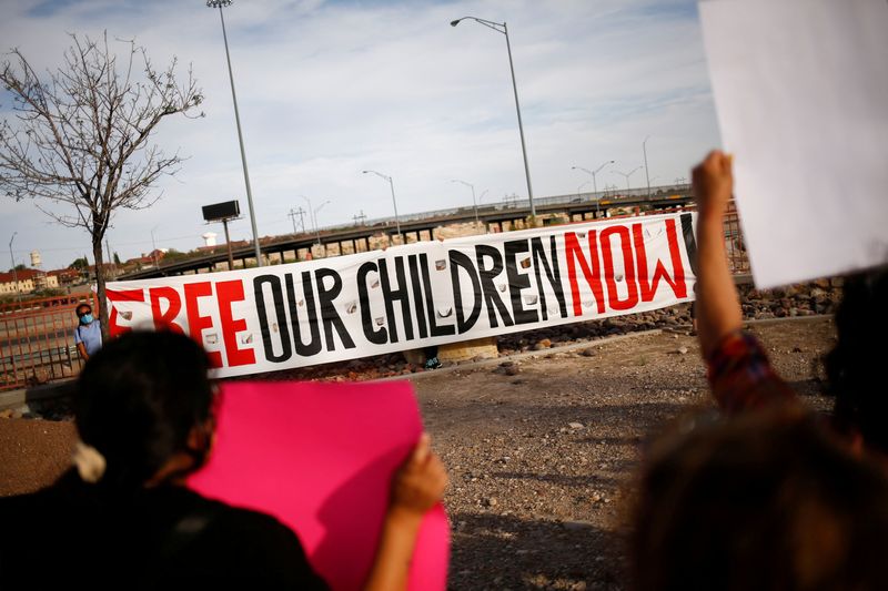FILE PHOTO: Activists defending the rights of migrants hold a protest near Fort Bliss to call for the end of the detention of unaccompanied minors at the facility in El Paso