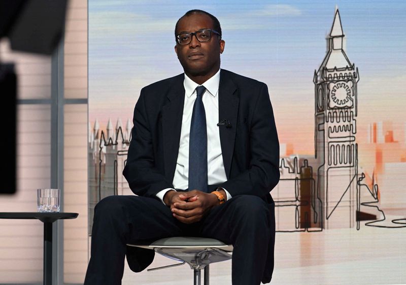 FILE PHOTO: British Chancellor of the Exchequer Kwasi Kwarteng attends an interview with Laura Kuenssberg