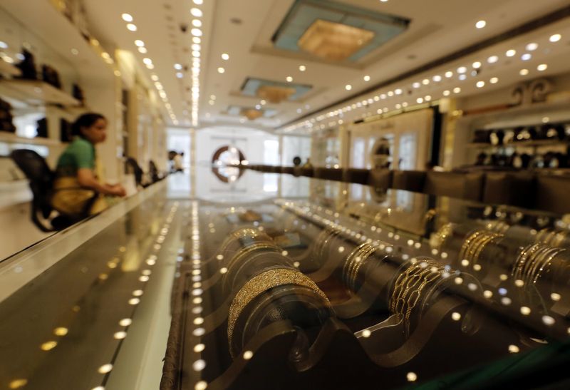 Gold jewellery is displayed at a shop in New Delhi