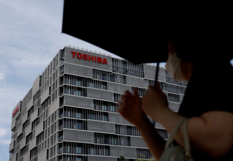 FILE PHOTO: The logo of Toshiba Corp. is displayed atop of the company's facility building in Kawasaki, Japan