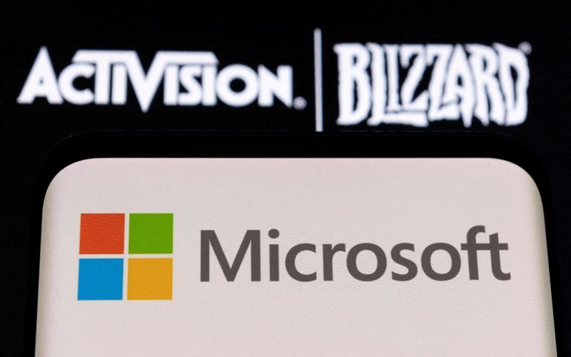 FILE PHOTO: Illustration of Microsoft and Activision Blizzard logos