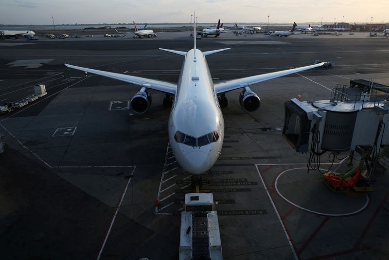 An airplane sits on the tarmac at John F. Kennedy International Airport on the July 4th weekend in Queens, New York City