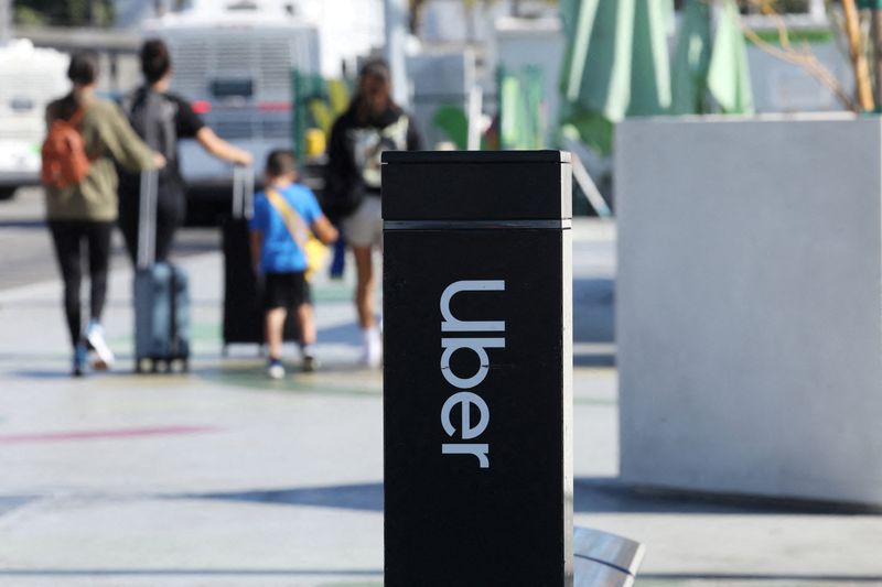 FILE PHOTO: Uber signage is posted at Los Angeles International Airport (LAX) in Los Angeles