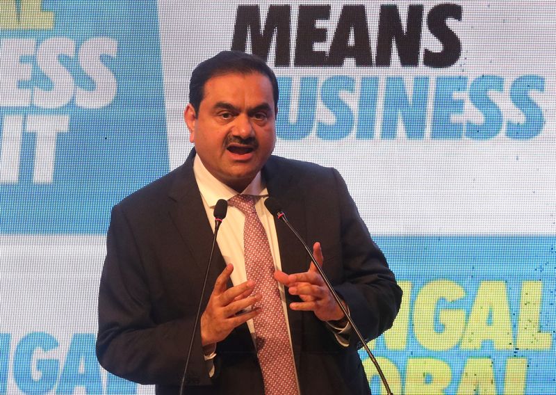 FILE PHOTO: Indian billionaire Gautam Adani addresses delegates during the Bengal Global Business Summit in Kolkata