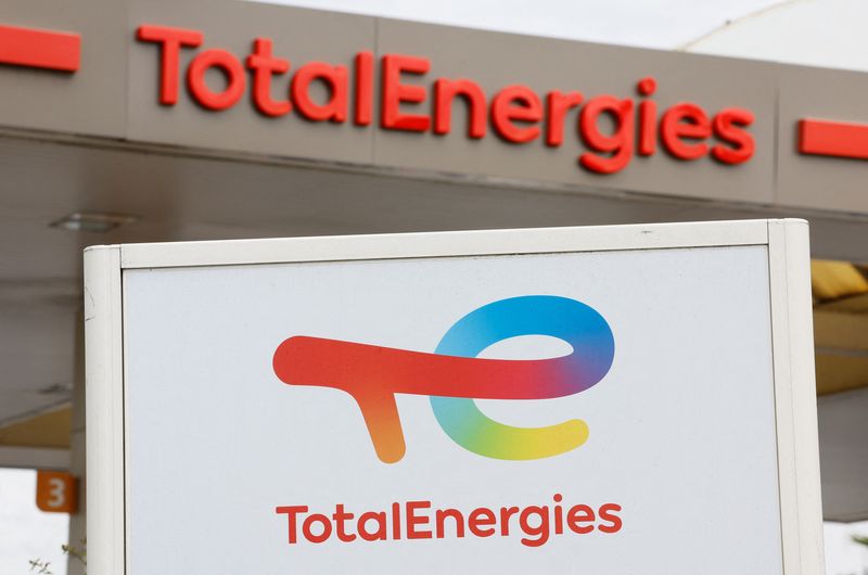 FILE PHOTO: TotalEnergies logos are seen at a fuel station in Nice