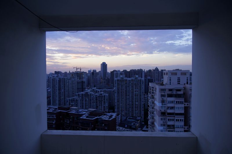 FILE PHOTO: Buildings of residential compounds are seen in Shanghai