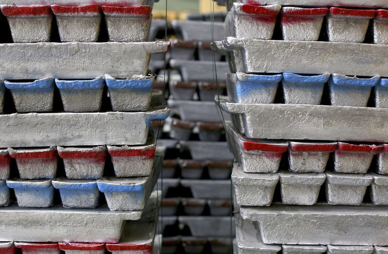 Stacks of leads bars, used for preparing FIAMM batteries, are seen as they are charged in this photo illustration taken at the battery maker's factory in Avezzano, near L'Aquila