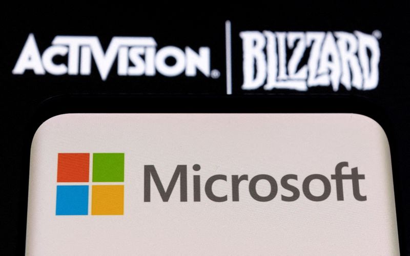 FILE PHOTO: Illustration of Microsoft and Activision Blizzard logos