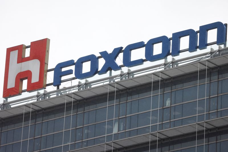 FILE PHOTO: The logo of Foxconn is pictured on top of a company's building in Taipei