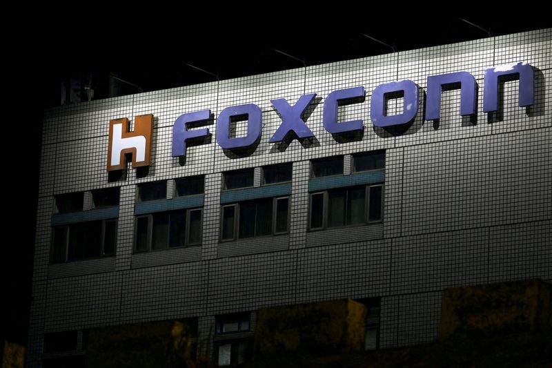 FILE PHOTO: FILE PHOTO: The logo of Foxconn is seen outside a company's building in Taipei, Taiwan