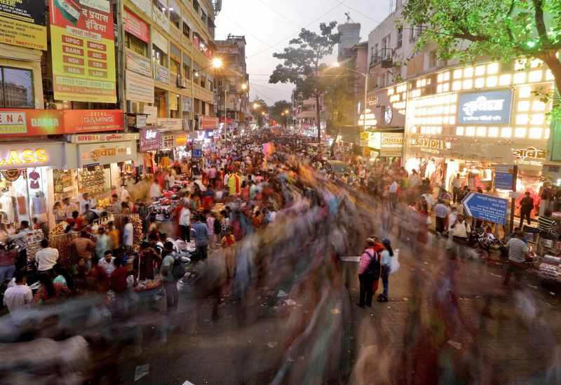 Shoppers crowd at a market place ahead of the Hindu festival of Diwali in Mumbai