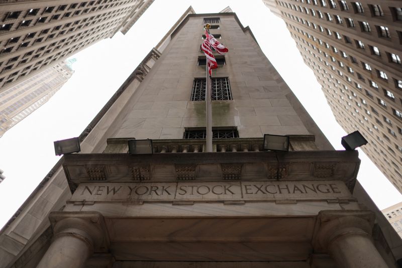 FILE PHOTO: Signage is seen at the New York Stock Exchange (NYSE) in Manhattan, New York City