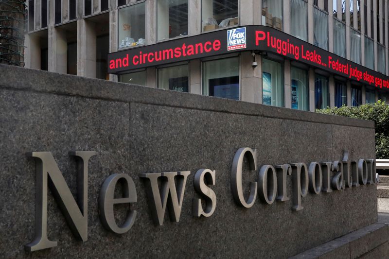 FILE PHOTO: The Fox News electronic ticker is seen outside the News Corporation building in New York City