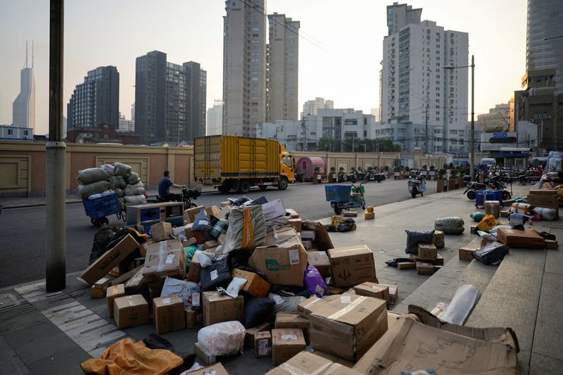 FILE PHOTO: Parcels are seen at a makeshift logistics station ahead of Alibaba's Singles' Day shopping festival, following a coronavirus disease (COVID-19) outbreak in Shanghai