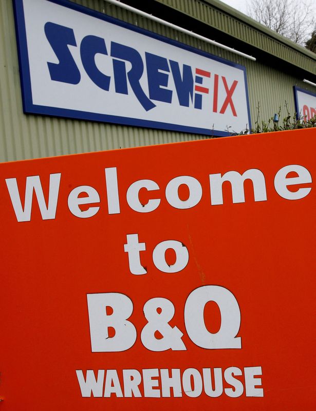 FILE PHOTO: Signs outside the B&Q and Screwfix stores in Loughborough, Britain