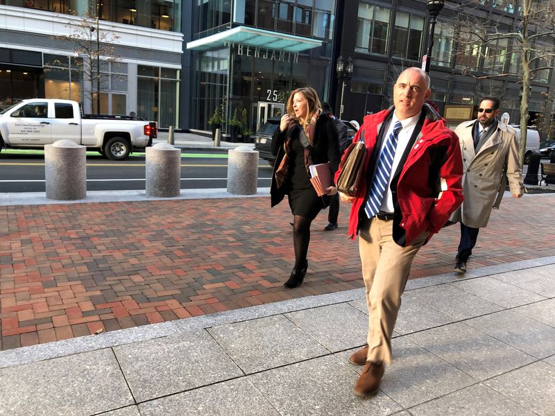 FILE PHOTO: Gregory Conigliaro a co-owner of the now-defunct New England Compounding Center enters the federal court in Boston