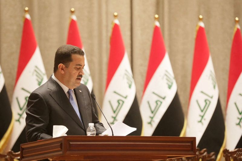 Iraqi Prime Minister-designate Mohammed Shia al-Sudani speaks during a vote on Sudani's cabinet at the parliament in Baghdad