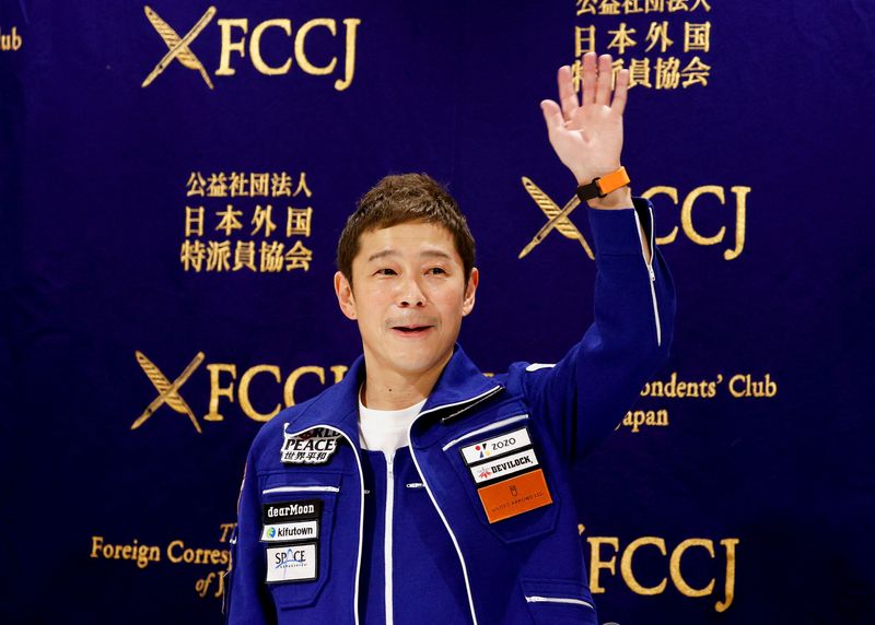 Japanese billionaire Yusaku Maezawa attends a news conference after returning to Japan after a journey into space, in Tokyo