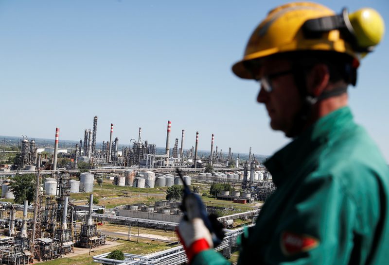 FILE PHOTO: An employee looks on at Hungarian MOL Group's Danube Refinery in Szazhalombatta