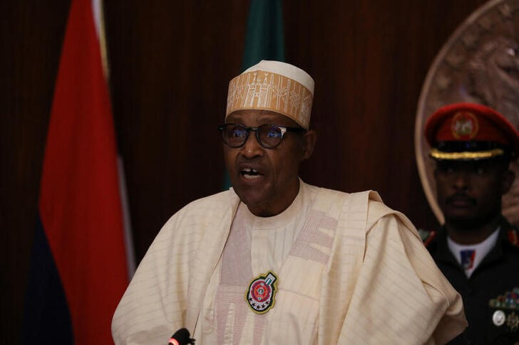Nigerian President Muhammadu Buhari speaks during the launch of the new Nigerian currency in Abuja