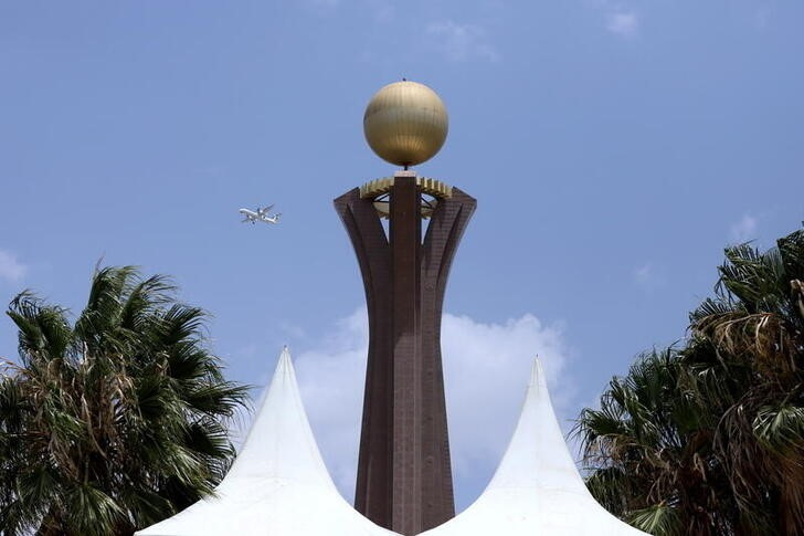 Plane flies next to Tigray Martyrs’ monument during the funeral ceremony of Ethiopia's Army Chief of Staff Seare Mekonnen in Mekele