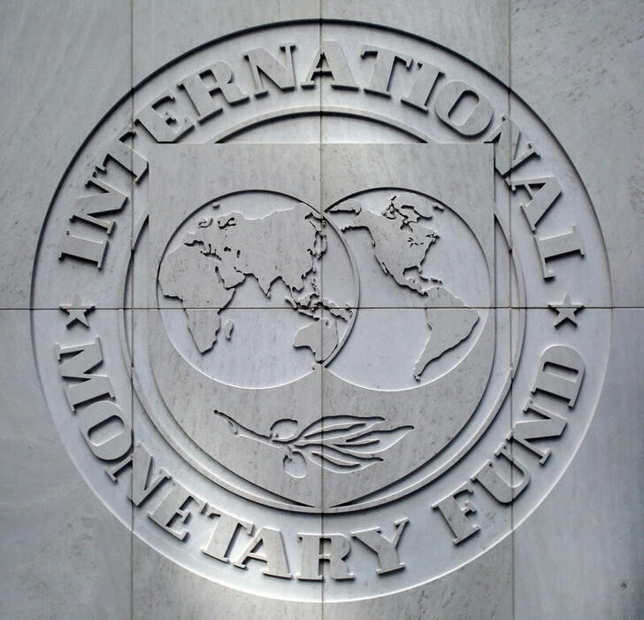 FILE PHOTO: International Monetary Fund logo is seen inside the headquarters at the end of the IMF/World Bank annual meetings