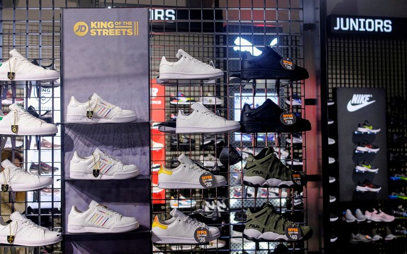 FILE PHOTO: Footwear on display at a JD Sports store in London, Britain
