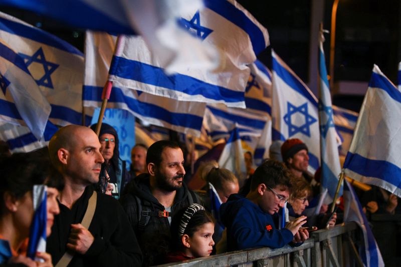 Israelis protest against Prime Minister Benjamin Netanyahu's new right-wing coalition in Tel Aviv